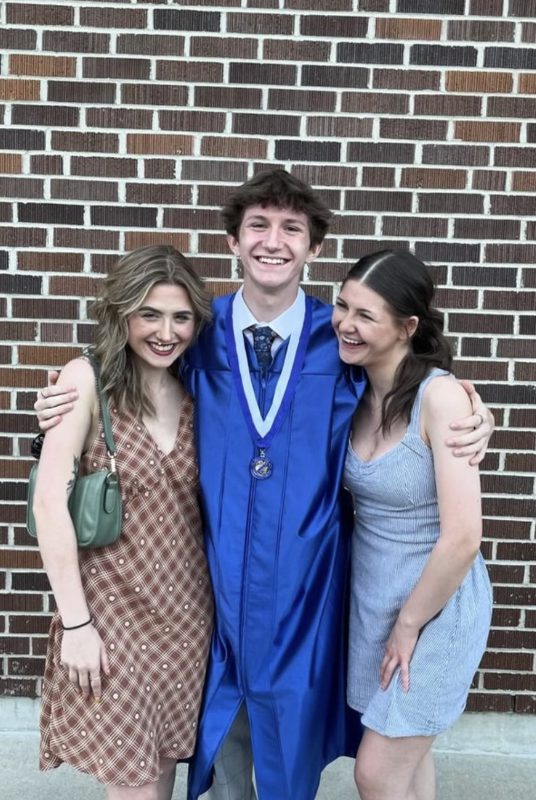 On  May 28, 2024 at Highlands High School, Ashton Adkins celebrated with his sisters Abby and Alivia Adkins after graduating from high school. 